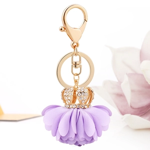 Elegant gold crown flower keychain with lavender chiffon petals and sparkling rhinestones