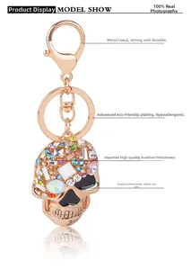 Macro shot of rose gold skull keychain with colorful Austrian crystals and lobster clasp