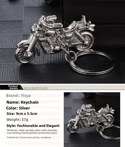 Close-up of a silver vintage motorcycle keychain with detailed alloy textures and ring