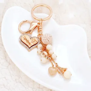 Portachiavi Romantico a Cuore in Legno Con Künstliche Perle Artificiali e Pallina all'Uncinetto Ciondolo Borsa Inciso I Love You Regalo Donna