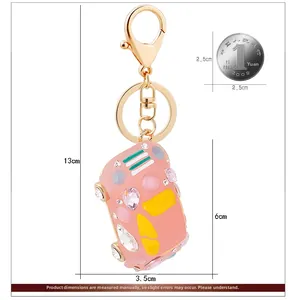 Pink beetle car keychain charm featuring colorful rhinestones with size dimensions