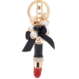 Porte-clés rouge à lèvres avec nœud noir et perles blanches pour décoration de sac à main