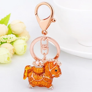 Rose gold zodiac horse keychain with orange enamel and auspicious cloud patterns