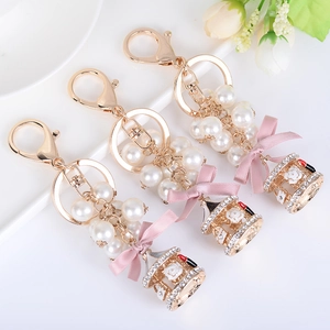 Creative Carousel Keychain With Faux Artificial Pearl And Satin Bow Gold Plated Zinc Alloy Enamel Rhinestone Bag Pendant For Women