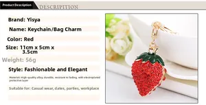 Detail view of rhinestone strawberry keychain with gold plating and 11cm length size info