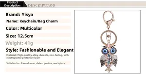 Detail view of rhinestone owl keychain measuring 12.5cm and weighing 41g with gold alloy