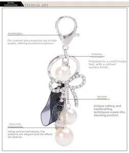 Detail of keychain featuring pearls, rhinestone bow, and ribbon with Forever Love engraving