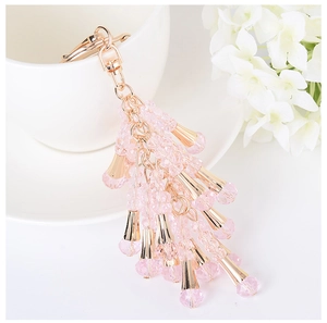 Close-up of pink crystal bead tassel pendant with rose gold plated alloy clasp