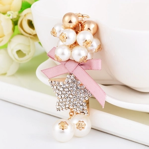 Star pearl keychain with pink silk bow and sparkling rhinestones for handbags