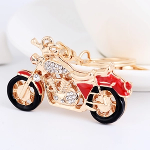Porte-clés moto créatif en métal doré avec détails en émail rouge et strass brillants