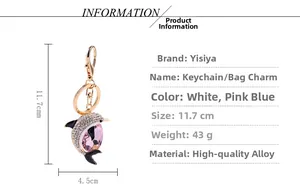 Detail view of crystal dolphin keychain showing pink teardrop stone and 11.7cm dimensions