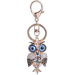Creative gold owl keychain with sparkling rhinestones and blue evil eye design