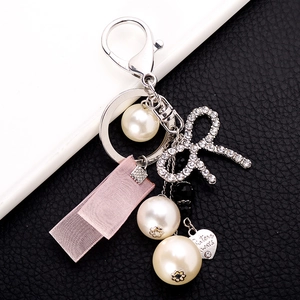 Pink ribbon heart keychain with pearl beads and sisters always engraved metal tag