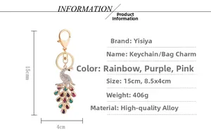 Close-up of a crystal peacock keychain with detailed size measurements and alloy material info