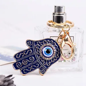 Portachiavi Mano di Fatima con smalto Evil Eye e strass lucidi su metallo dorato