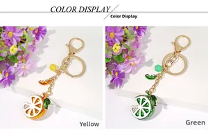Detail of yellow and green lemon fruit keychains with rhinestones and gold tassels