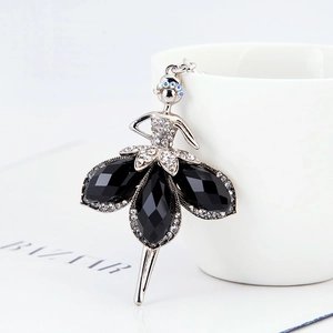 Detailed view of ballet dancer keychain with black crystals and silver plating