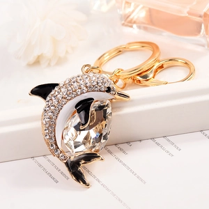 Luxury dolphin keychain with sparkling rhinestones and a large pear-shaped crystal