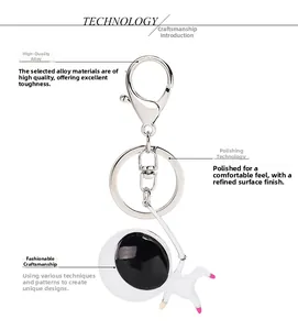 Detail of high-quality alloy keychain with polished astronaut pendant and metal clasp