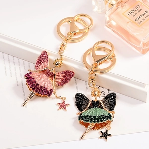 Elegant angel ballerina keychain with sparkling rhinestones and star charm in gold plating