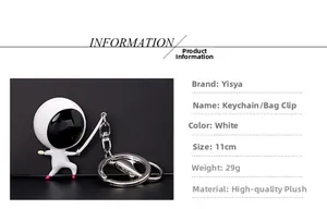 Detailed view of astronaut keychain with 11cm height and 29g weight specifications