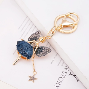 Elegant angel fairy keychain with blue beaded skirt and sparkling rhinestones on golden alloy