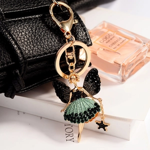 Elegant gold ballet girl keychain with green and black rhinestones for handbags