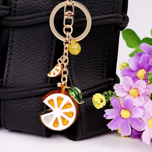 Creative alloy lemon keychain with sparkling rhinestones and leaf charm for handbags
