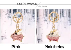 Detail of flying pig keychains with pink crystals and wings in a snowy forest setting