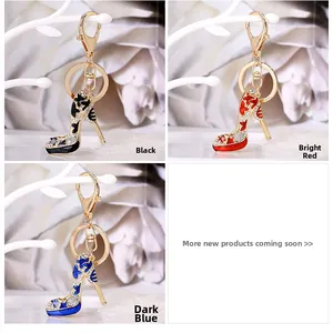 Detail of crystal high heel keychains in black, red, and blue with enamel floral patterns