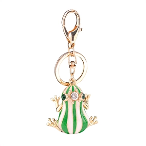 Porte-clés prince grenouille émaillé vert avec strass brillants et couronne dorée
