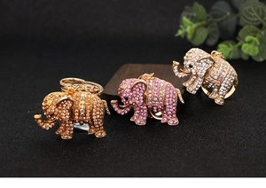 Close-up of elephant keychains with sparkling crystals and elegant alloy details