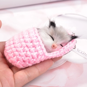 Sleeping plush hamster keychain with pink knit sleeping bag and silver key ring