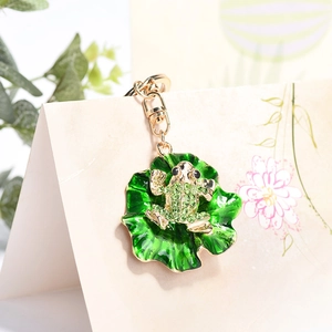 Green frog and lotus leaf keychain with sparkling rhinestones and gold-tone metal hook