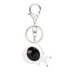 Astronaut keychain with silver metal hook and miniature space explorer figurine charm