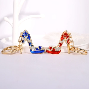 Elegant high heel keychain with alloy crystals and blue red enamel star patterns