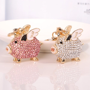 Creative flying pig alloy keychains with pink and white rhinestones and enamel wings