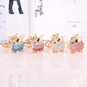 Creative flying pig alloy keychain set with sparkling rhinestones in four assorted colors