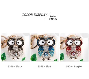 Detailed comparison of three rhinestone owl keychains in black blue and purple colors