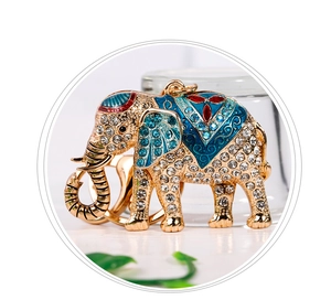 Close-up of elephant keychain with sparkling rhinestones and colorful enamel details