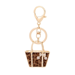 Creative leopard print mini handbag keychain with gold hardware and rhinestone bow accent