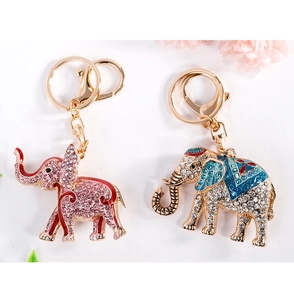 Detail of colorful rhinestone elephant keychains with gold plating and enamel finish