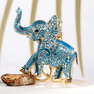 Creative elephant keychain with sparkling blue rhinestones and gold alloy plating