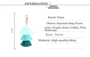 Close-up of bohemian triple tassel keychain with mint to dark green gradient detail