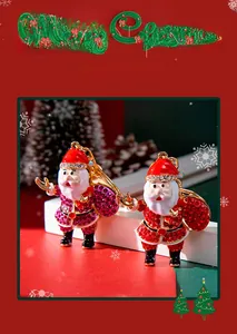Detail of Santa Claus keychain featuring colorful rhinestones and gold-tone metal clasp
