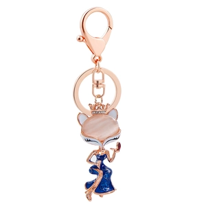 Exquisite crown fox keychain in rose gold with pink cat-eye stone and blue enamel