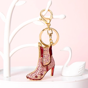 Pink rhinestone high heel boot keychain with red floral enamel on golden metal frame