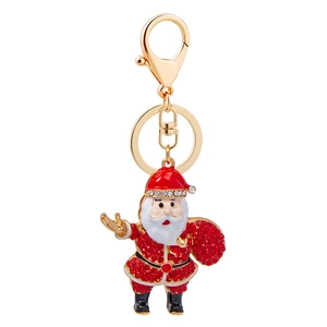 Sparkling Santa Claus keychain with red rhinestones and white enamel on a golden metal base