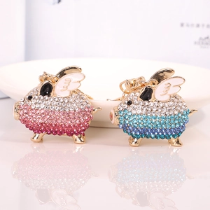 Porte-clés cochon volant créatifs avec strass colorés et ailes en métal doré