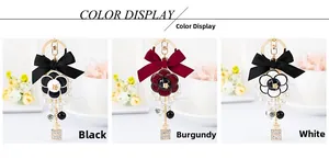 Detailed color display of camellia keychains with bows, pearls, and perfume bottle charms